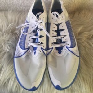 White and royal blue track Nike sneakers